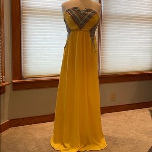 Beautiful yellow strapless maxi dress